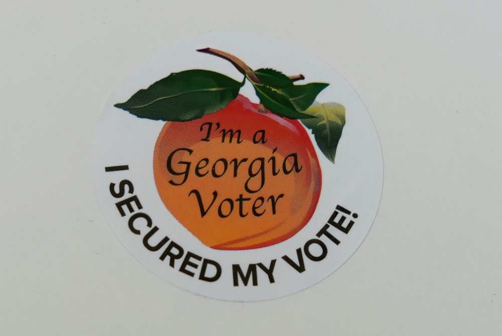 "I'm a Georgia Voter" written on a peach, with "I Secured My Vote" written below that.