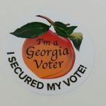 "I'm a Georgia Voter" written on a peach, with "I Secured My Vote" written below that.