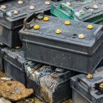 Discarded car batteries piled up, toxic waste