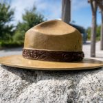 Article Banner - A representation of a National Park Service ranger hat set on a rock.